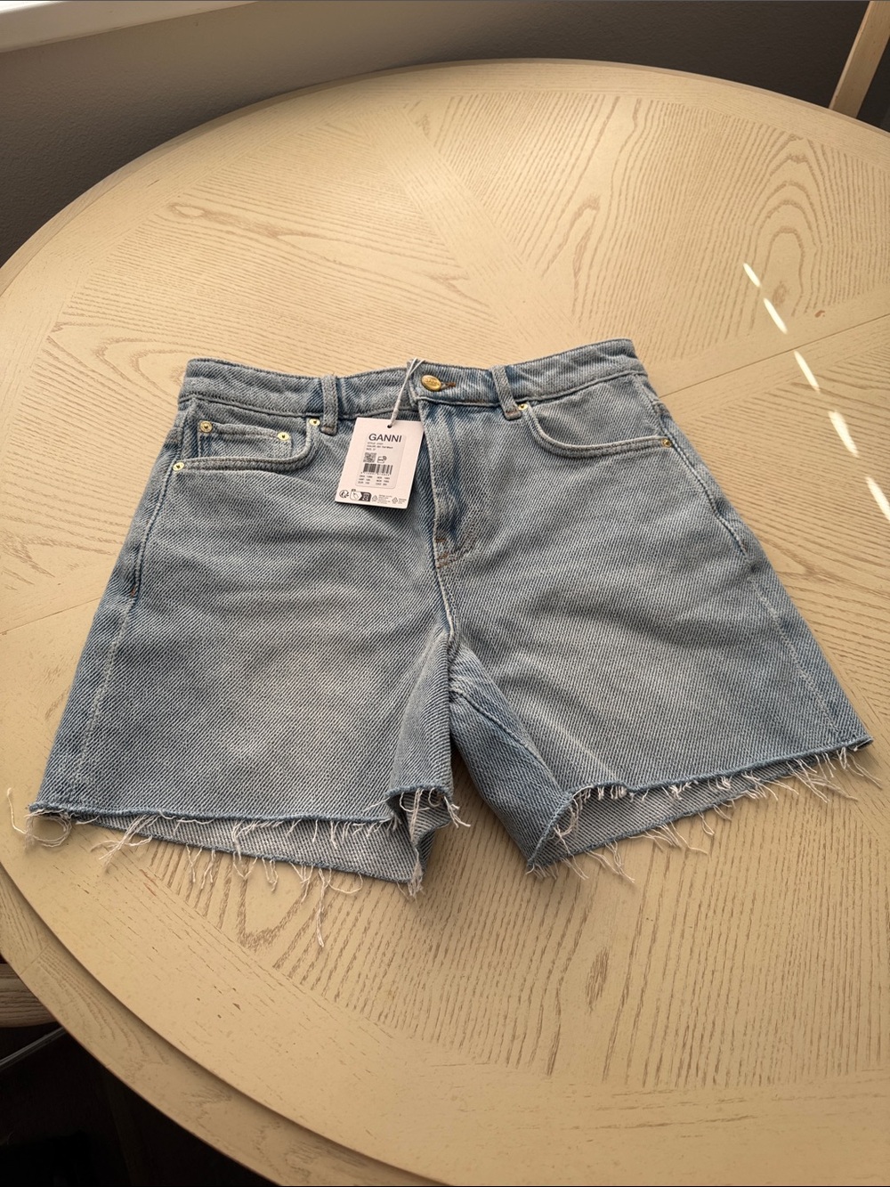 Ganni Faded Light Blue Frayed Denim Shorts